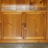 Pair of vintage cherry wood bookcases with lockable doors.