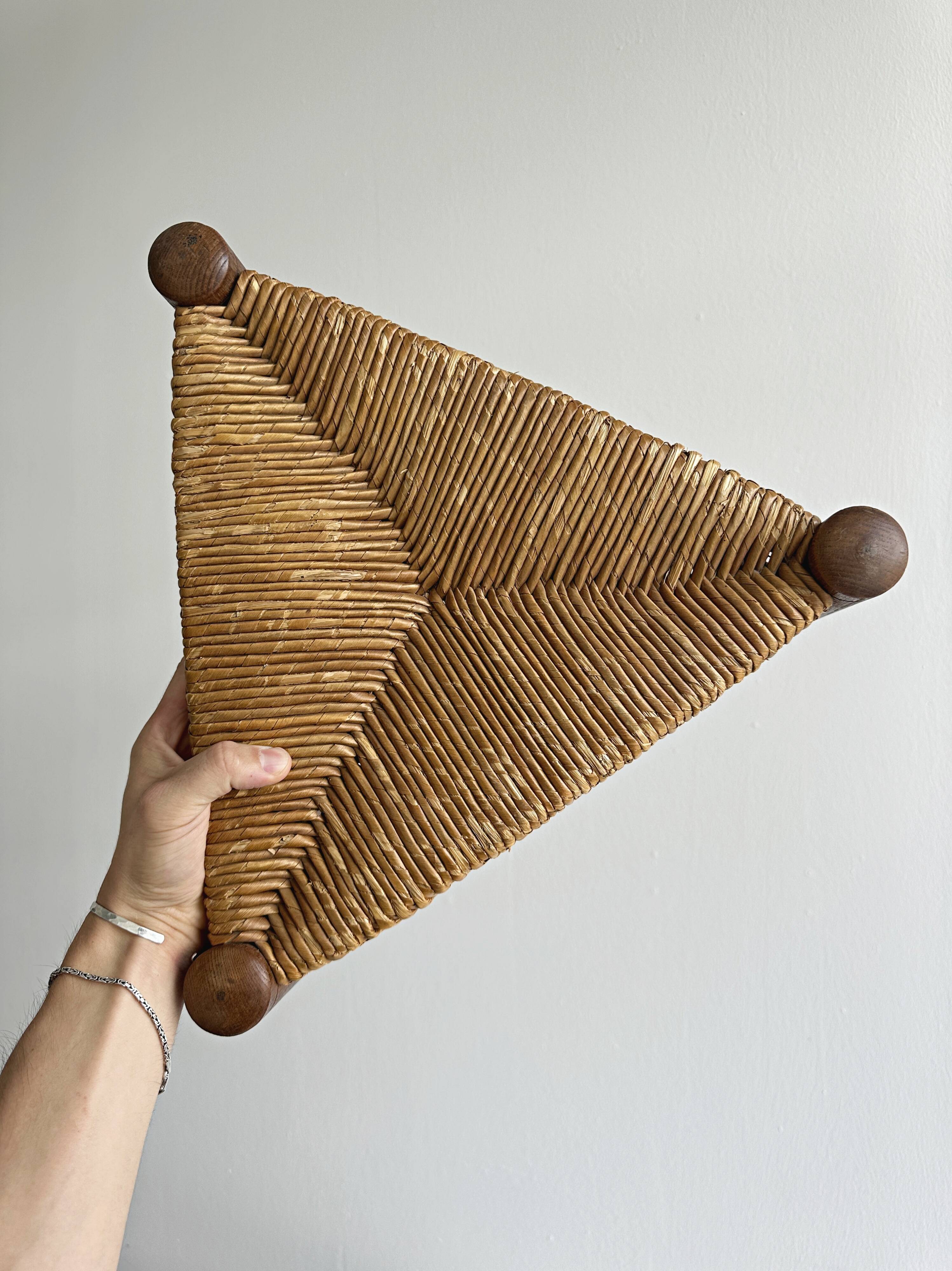 Triangular turned wooden stool