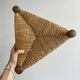 Triangular turned wooden stool