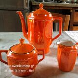 Iridescent orange porcelain coffee set from the 50s-60s with black edging