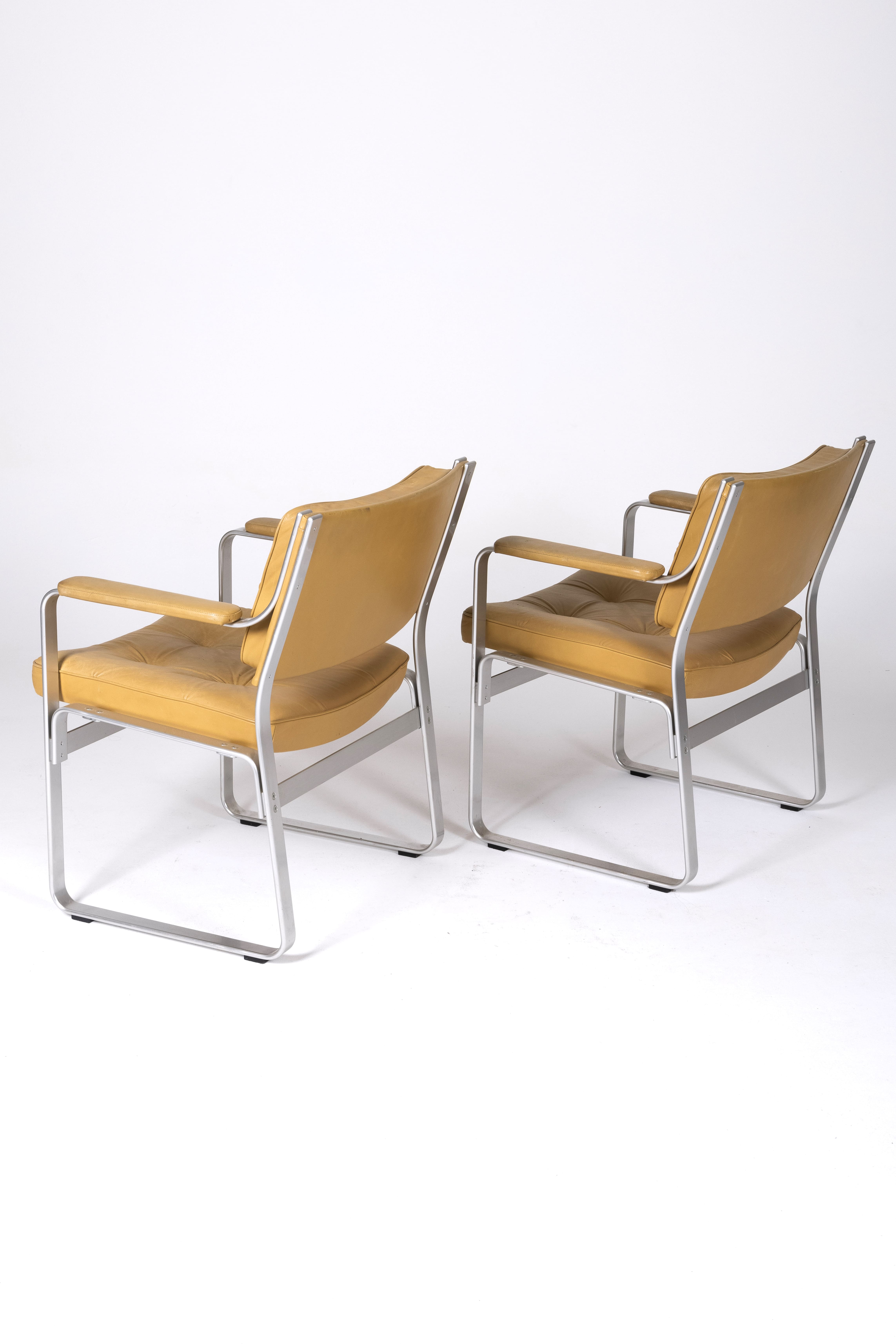 Leather and aluminum armchairs "Karl" by Erik Ekselius, 1960s