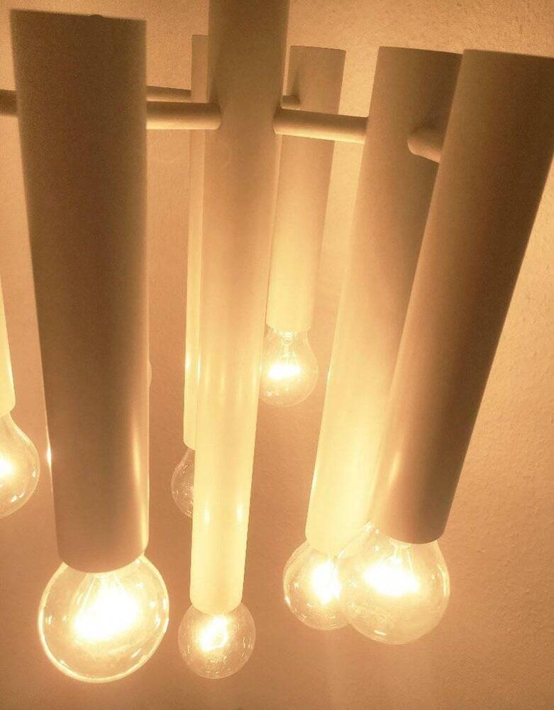 Minimalist suspension from the Swiss space age of the mid-century type 415 by Temde, 1960s.