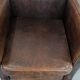 Sleekly shaped timeless design armchair made of sheepskin leather
