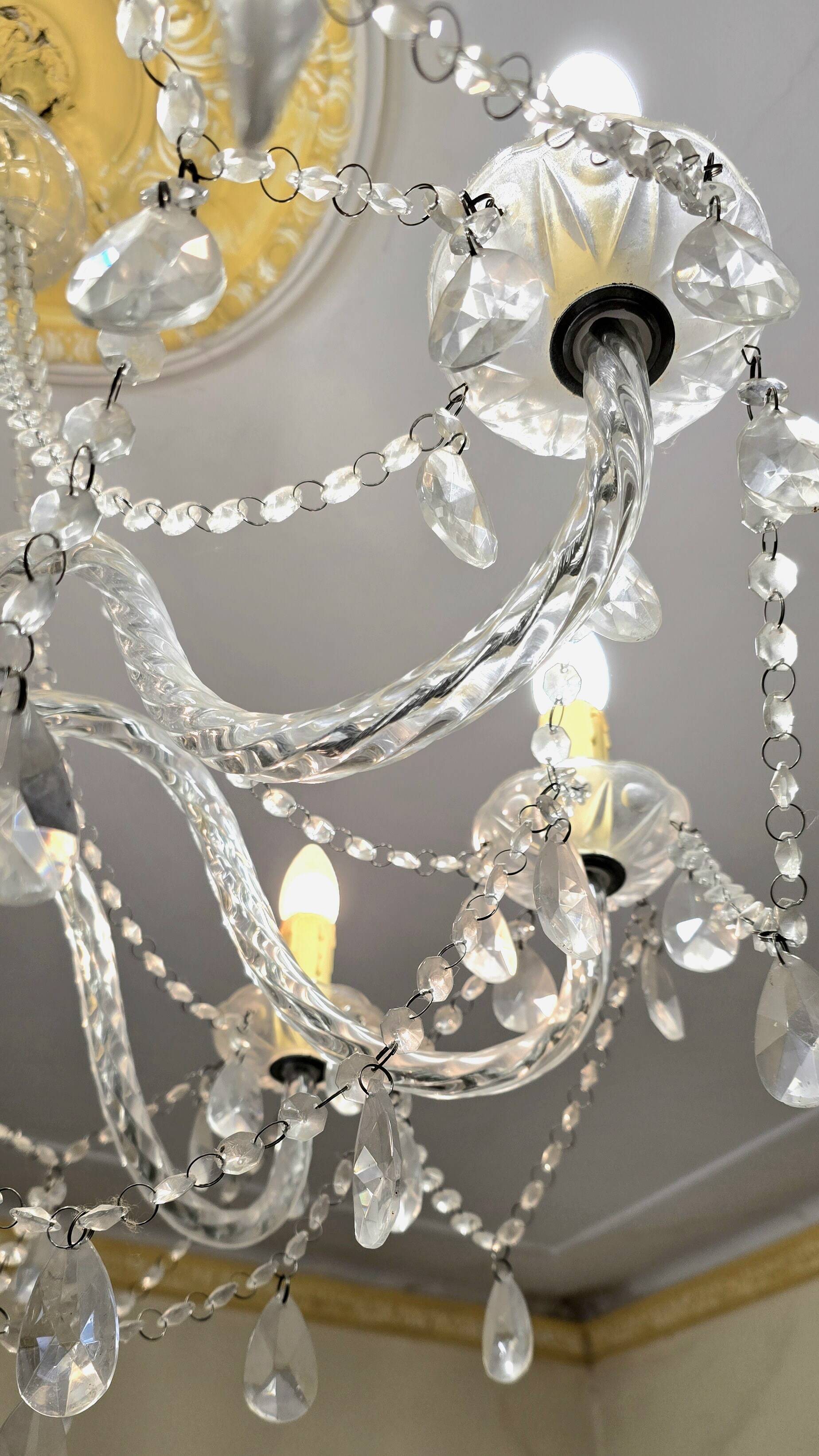 Glass chandelier with polypropylene arms – 9 lights