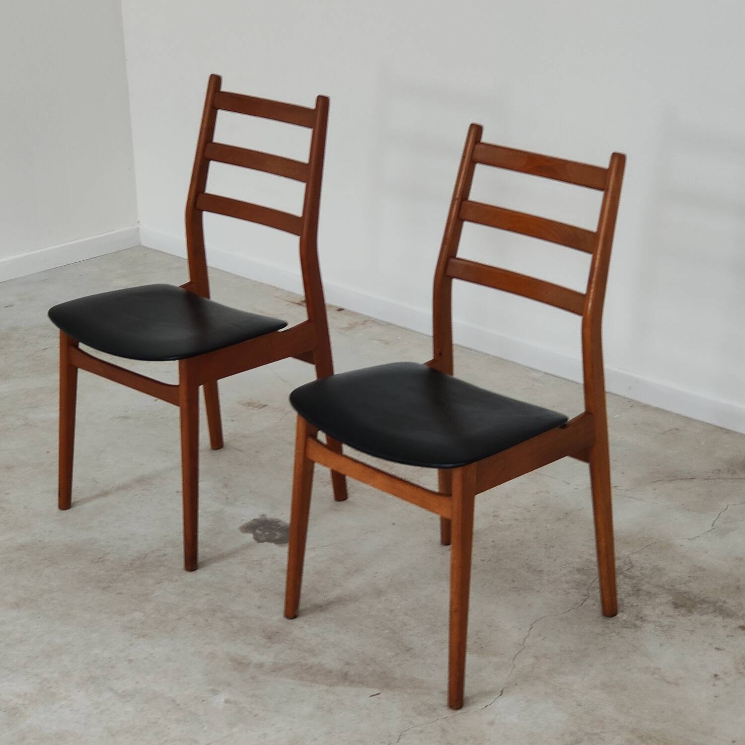 Pair of Scandinavian style leather and wood chairs 1970