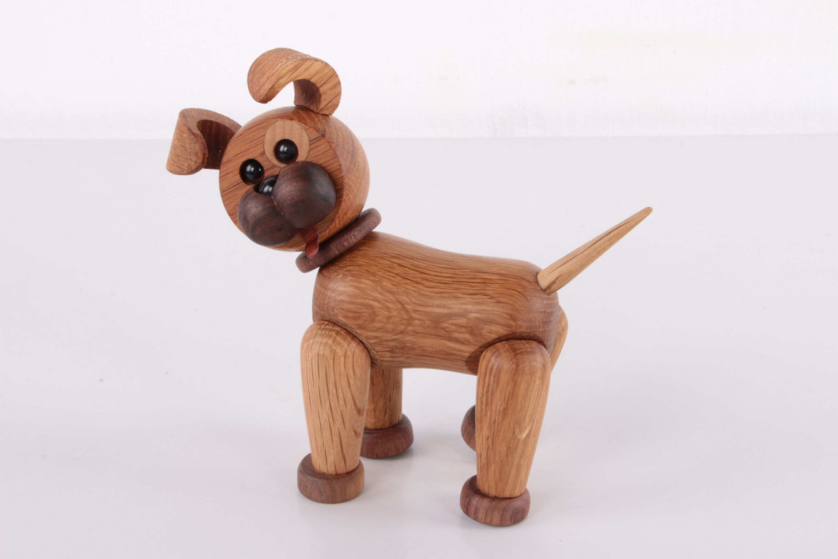 Cheerful wooden dog by chresten sommer for spring copenhagen denmark