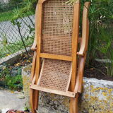 Cane folding armchair in solid wood
