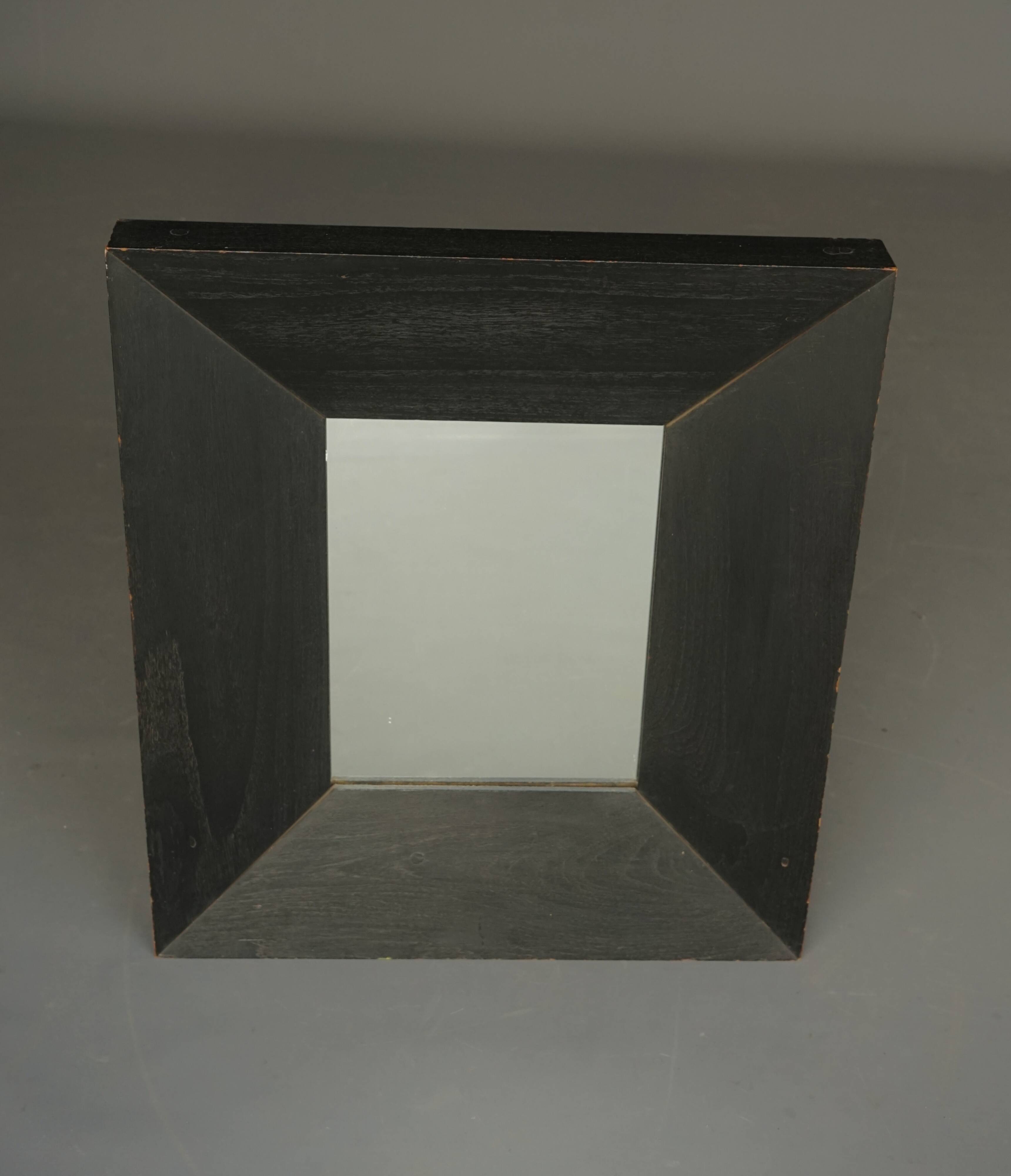 Thick framed vintage wall mirror