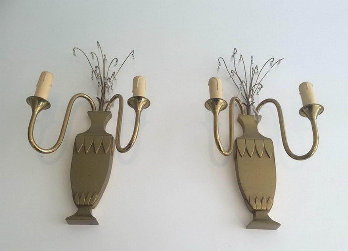 Pair of brass and crystal wall sconces