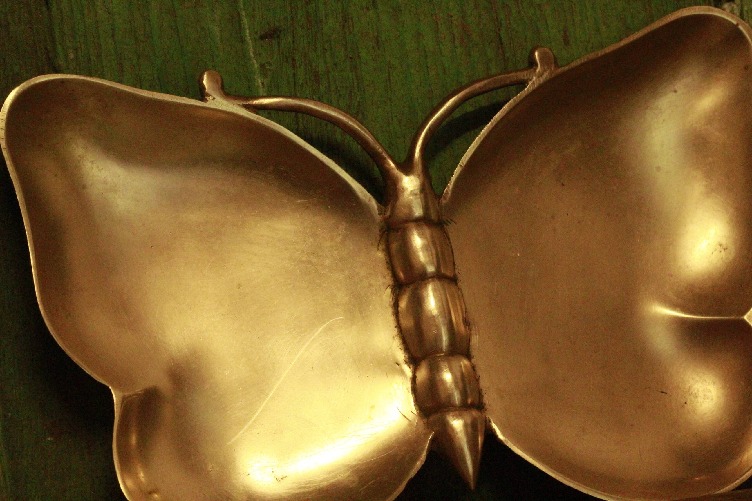 Brass butterfly tidy