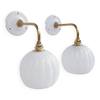 Brass and speckled glass wall lights from Clichy
