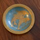 Empty pocket in brass dolphins design