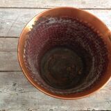 Cache hammered copper pot