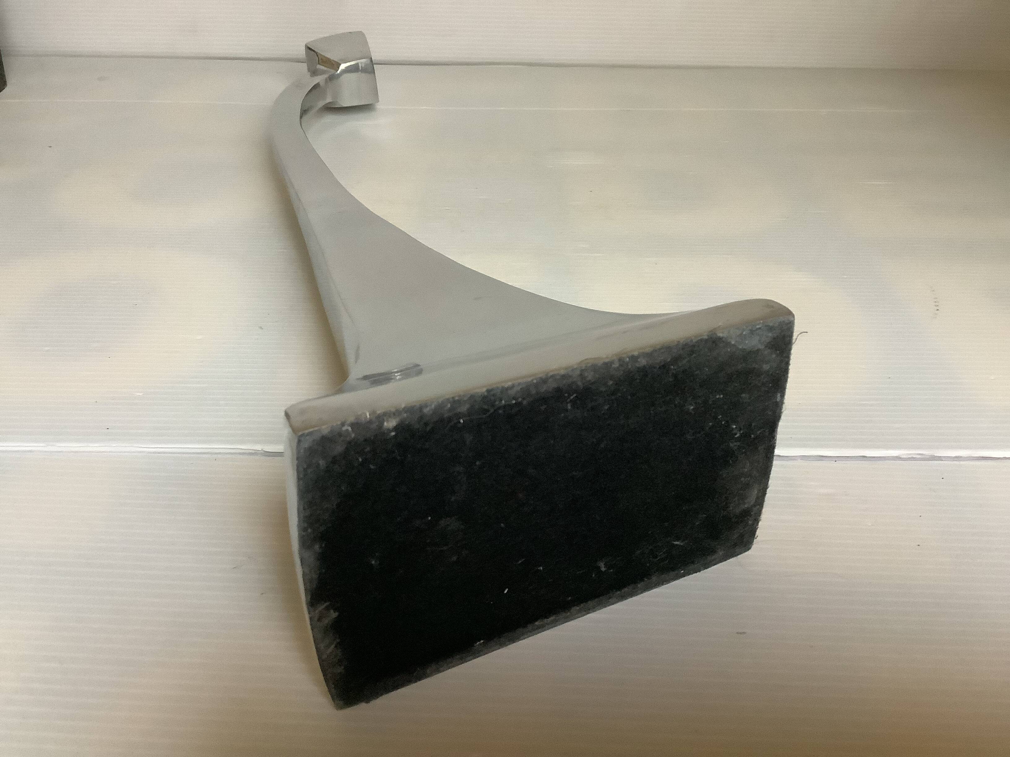 Large silver metal candlestick in the style of Xavier Lust