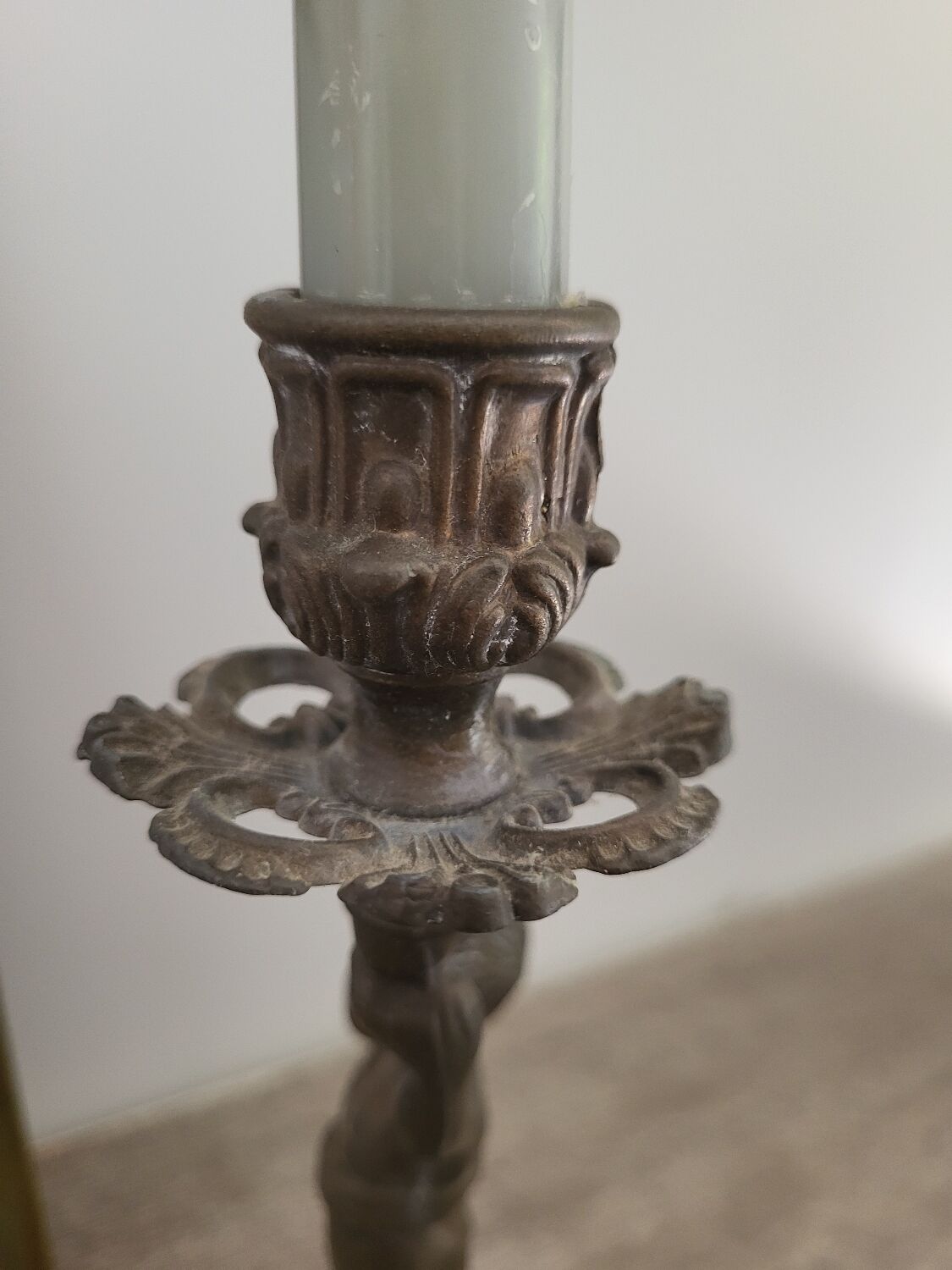 Pewter gray cherub candle holder.