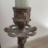 Pewter gray cherub candle holder.
