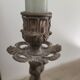Pewter gray cherub candle holder.