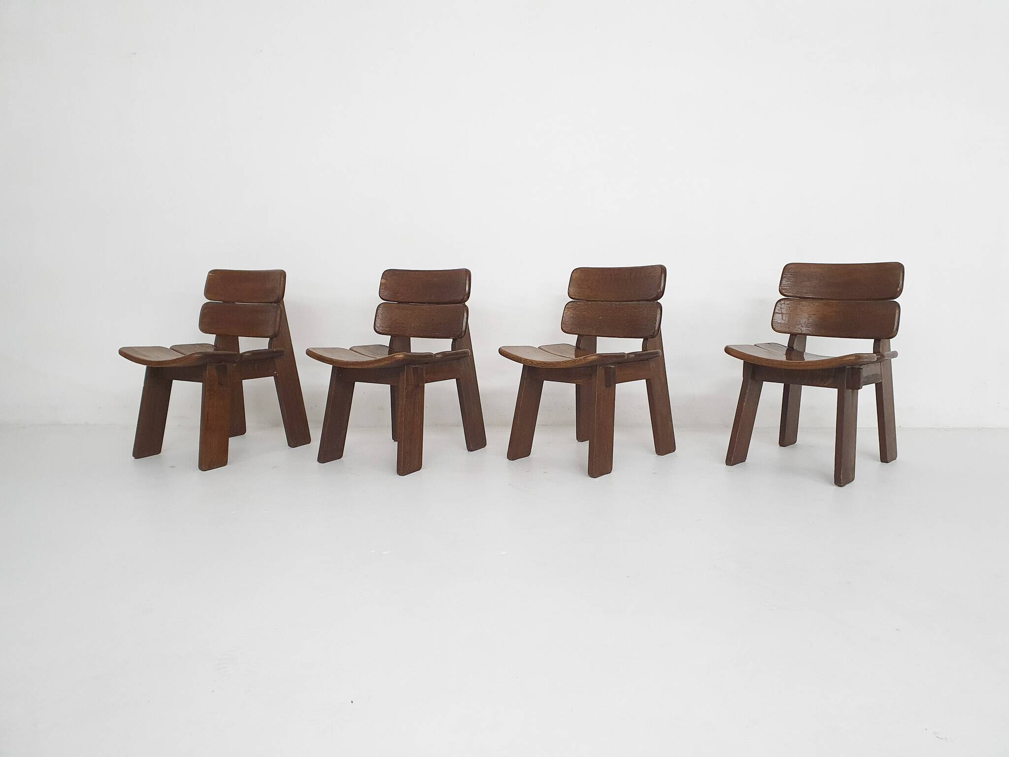 Set of four solid oak dining chairs, The Netherlands 1970's