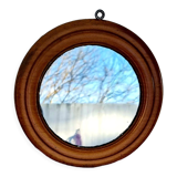 Round mirror in vintage wood