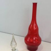 Large designer bottle in red glass