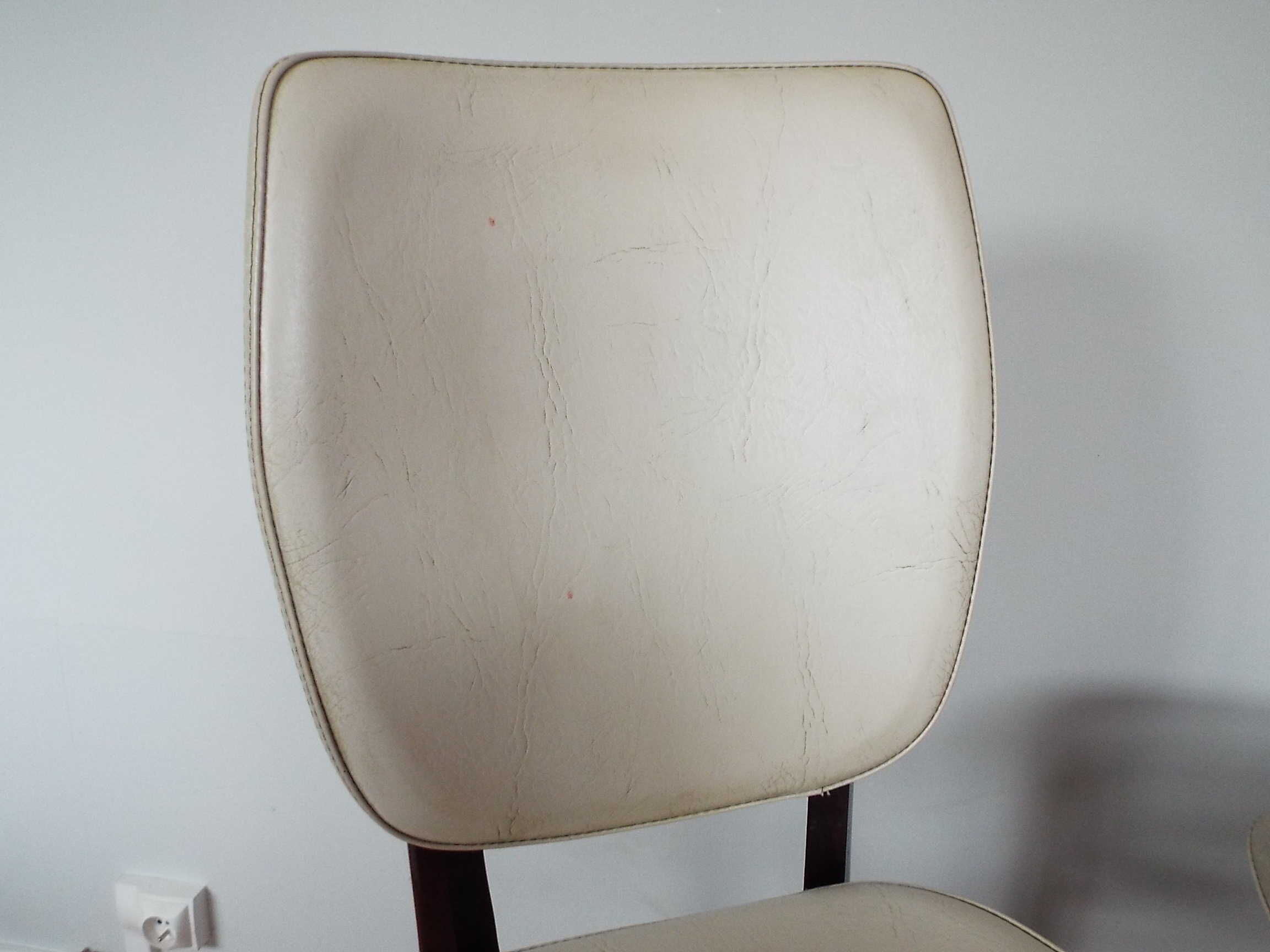 2 skai and wooden chairs