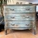 Antique commode with a patina in the Tuscan technique.