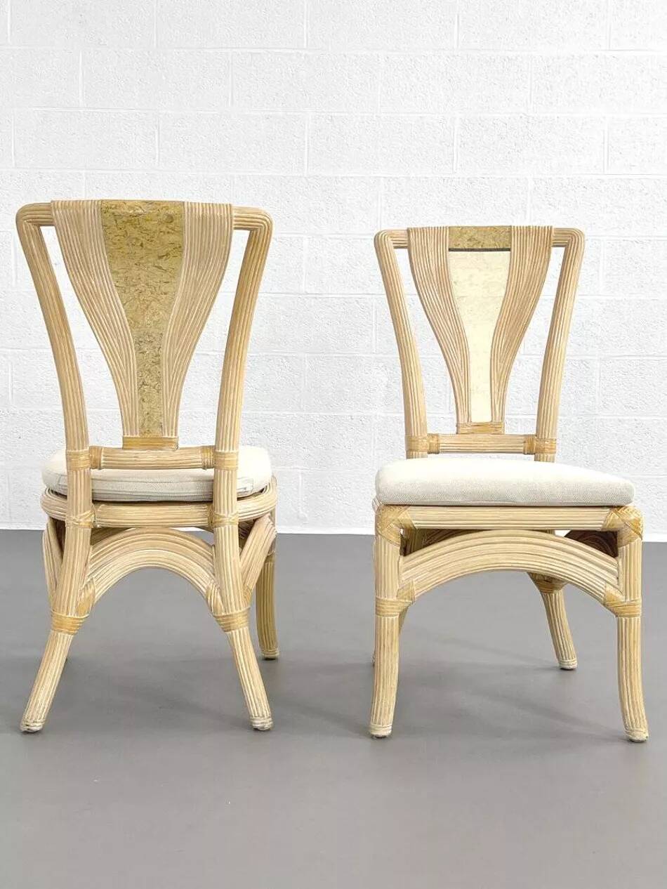 1970s rattan table with stone marquetry and matching chairs.