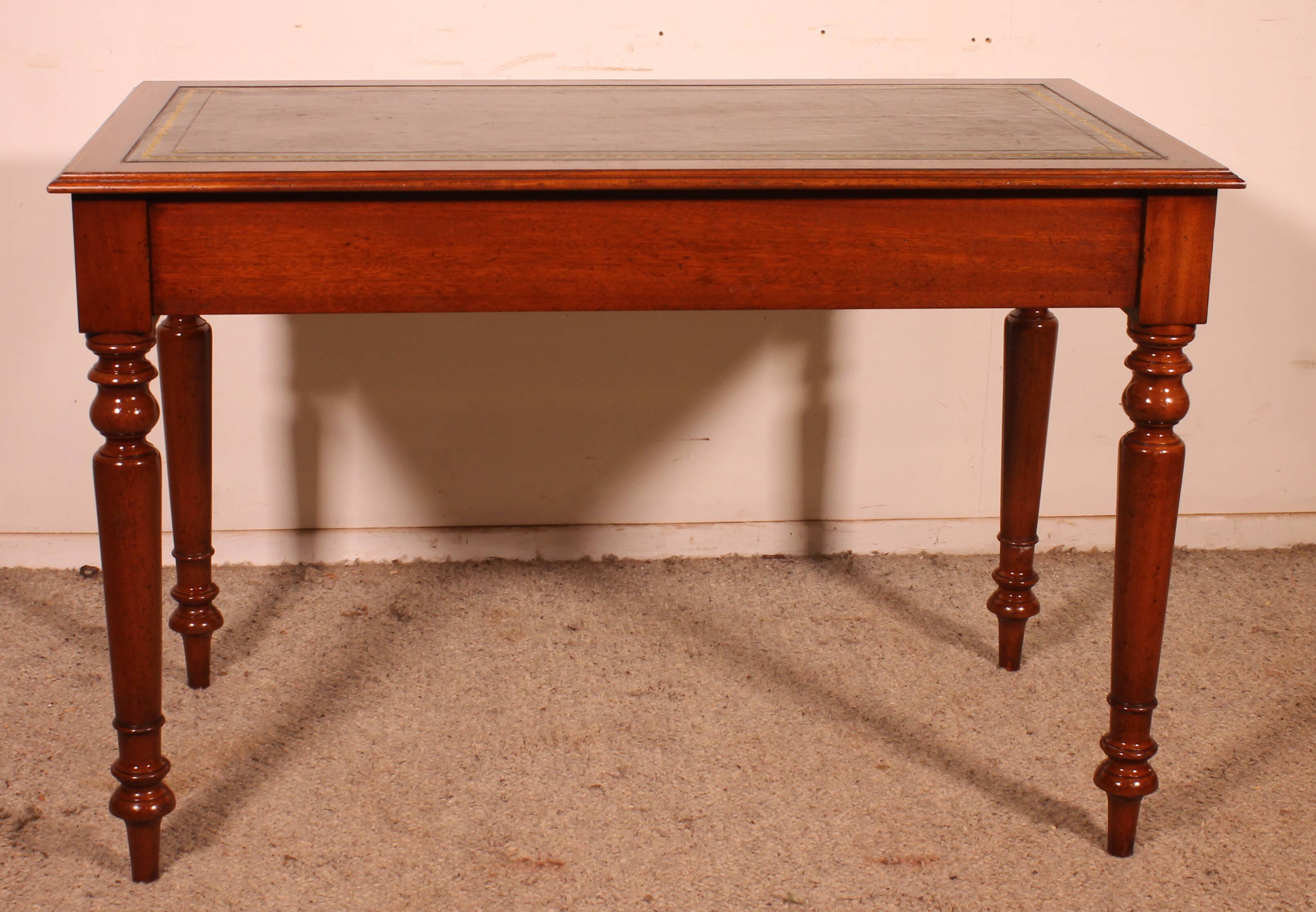 flat desk with two drawers from the 19th century in mahogany and inlays