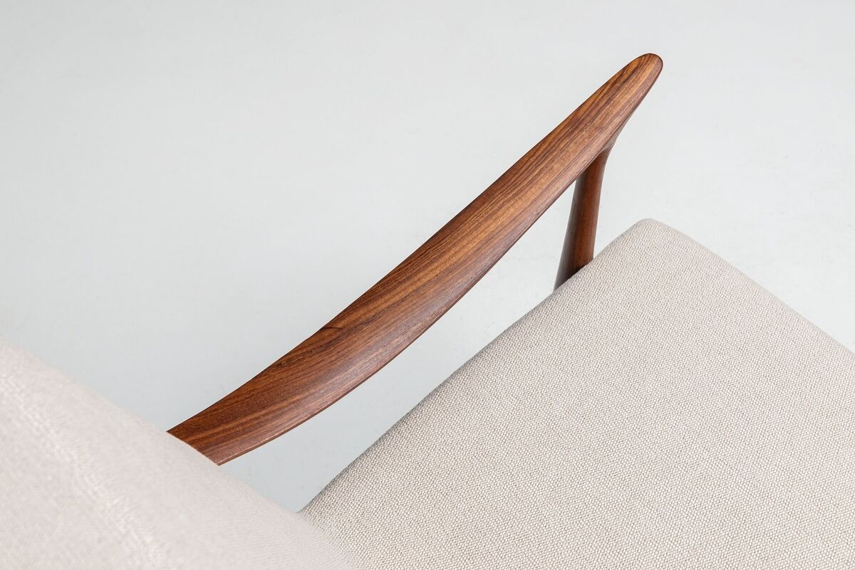 Sculptural Danish lounge chair in teak and fabric Denmark 1960
