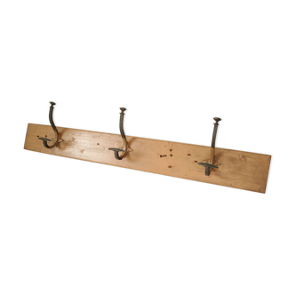 Old country wall coat rack in painted wood and iron