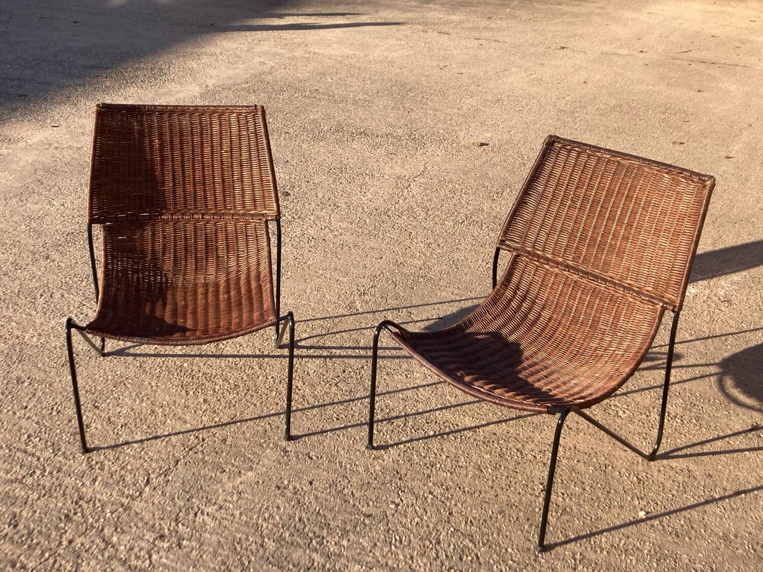 Pair of rattan and steel armchairs
