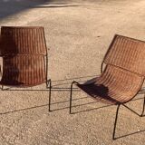 Pair of rattan and steel armchairs