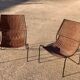 Pair of rattan and steel armchairs