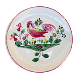 Old plate with flower and rooster pattern