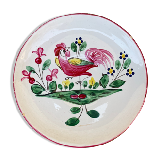 Old plate with flower and rooster pattern