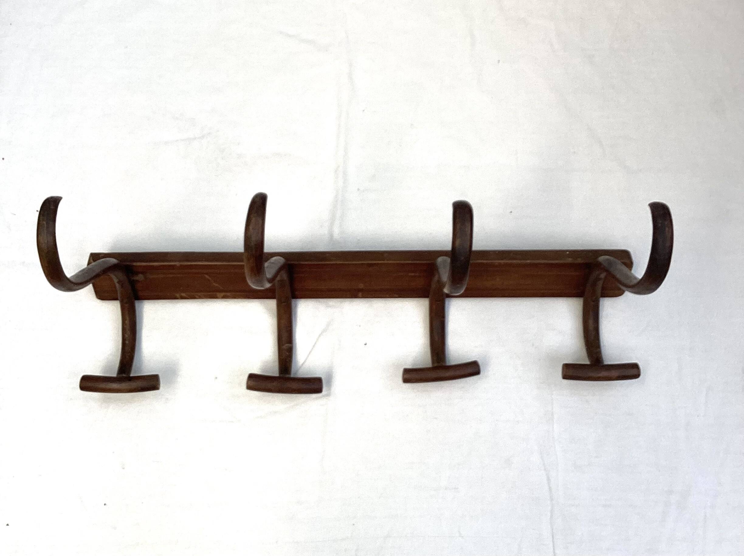 Coat rack signed Thonet with four hooks dimensions: height -32cm - width - 69cm-