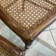 Pair of N2 antique caned and wooden chairs from the 1900s.