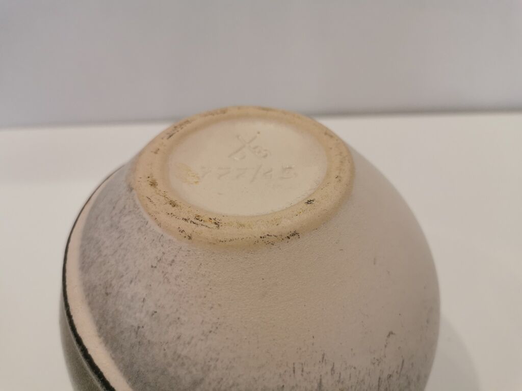 Grey potter's ball vase