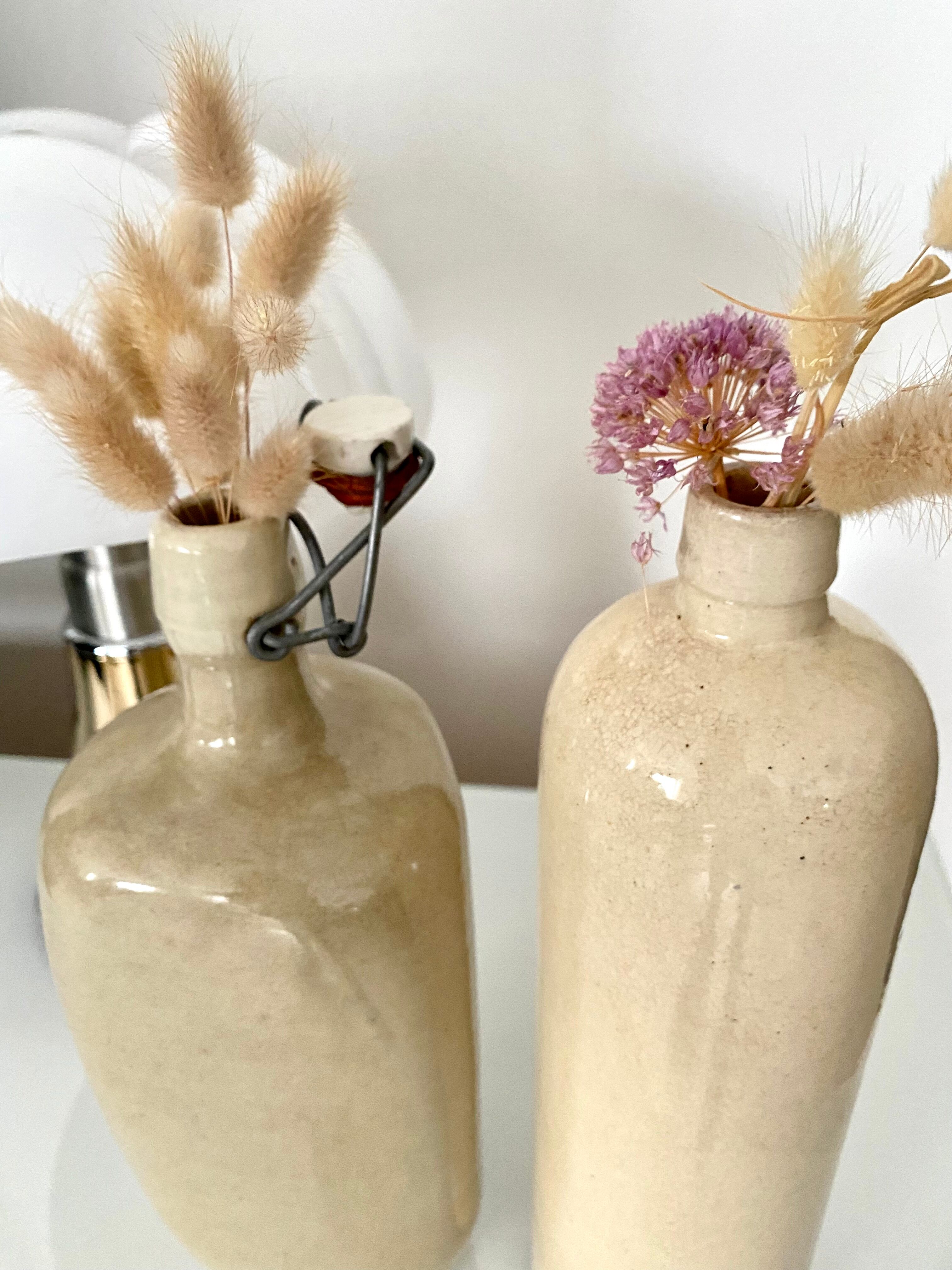 Set of 2 enamelled sandstone bottles