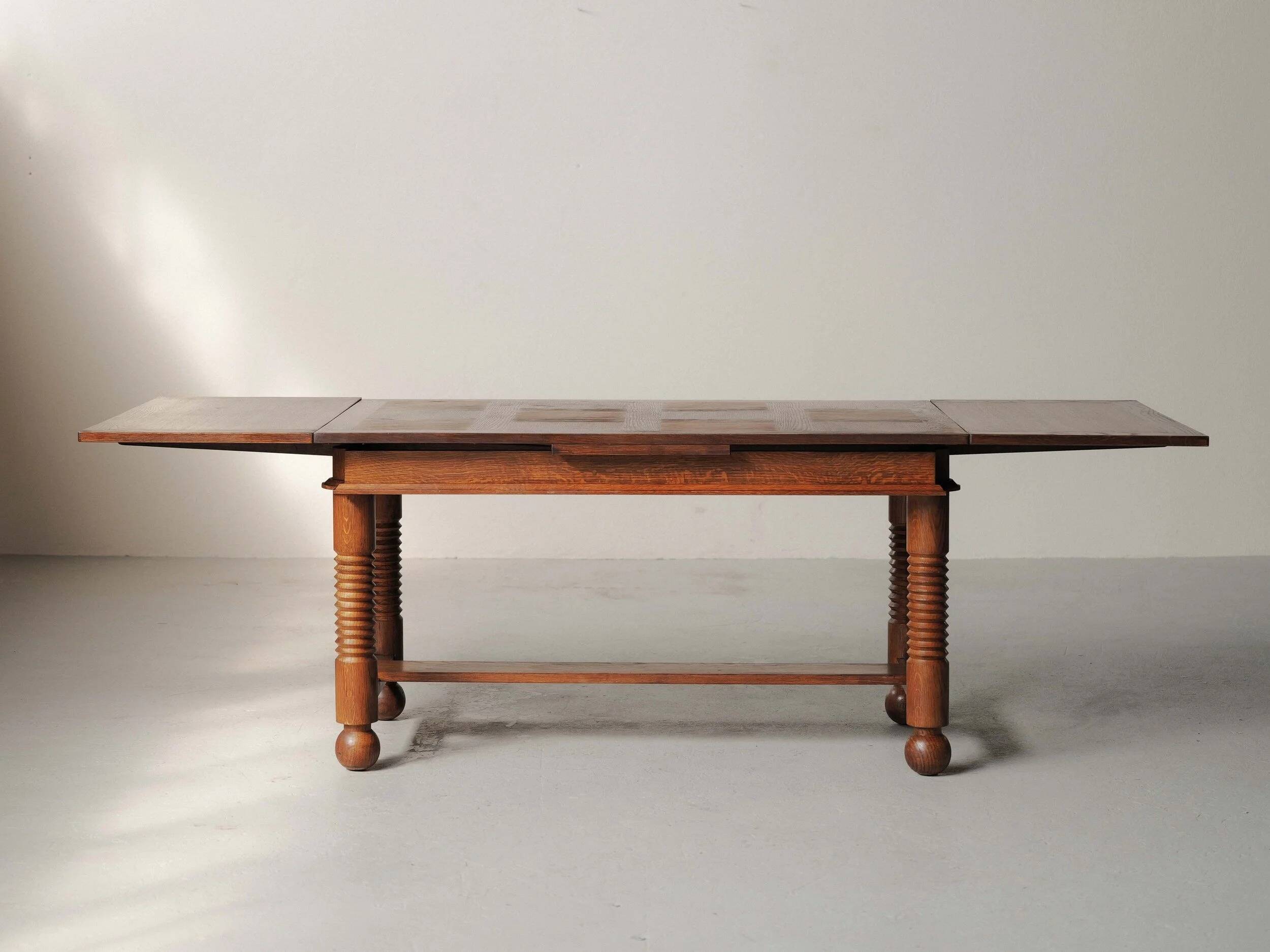 Modernist oak dining table, France, 1940–1950