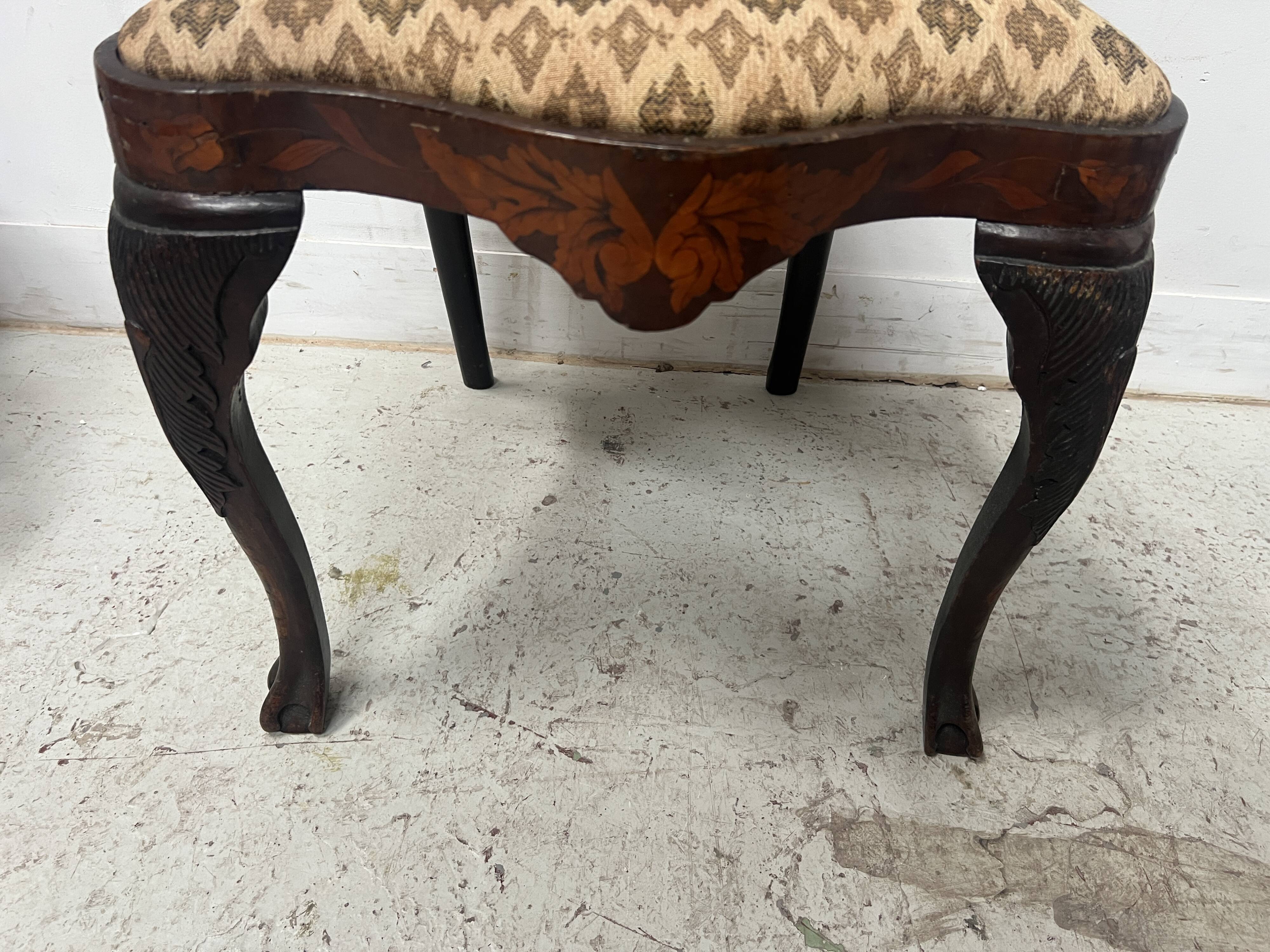Set of eight Dutch marquetry chairs from the 19th century.