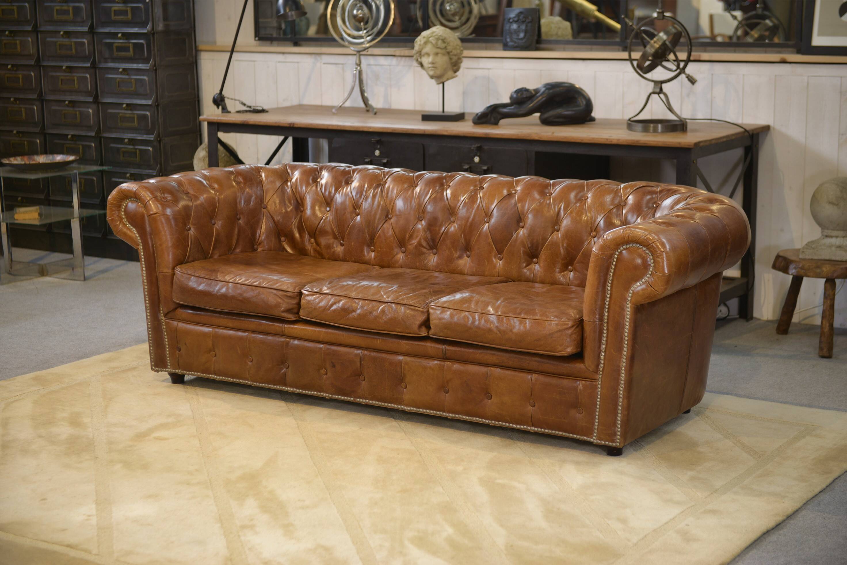 Brown leather Chesterfield sofa