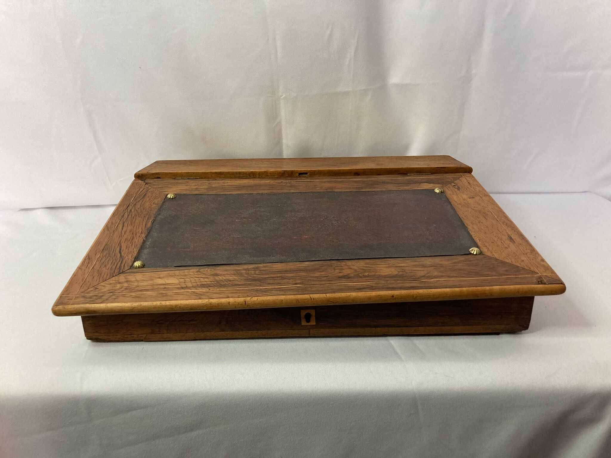 Old wooden writing board over leather early twentieth century