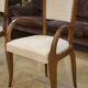 Pair of bridge armchairs in walnut and cream boucle fabric, early 20th century.