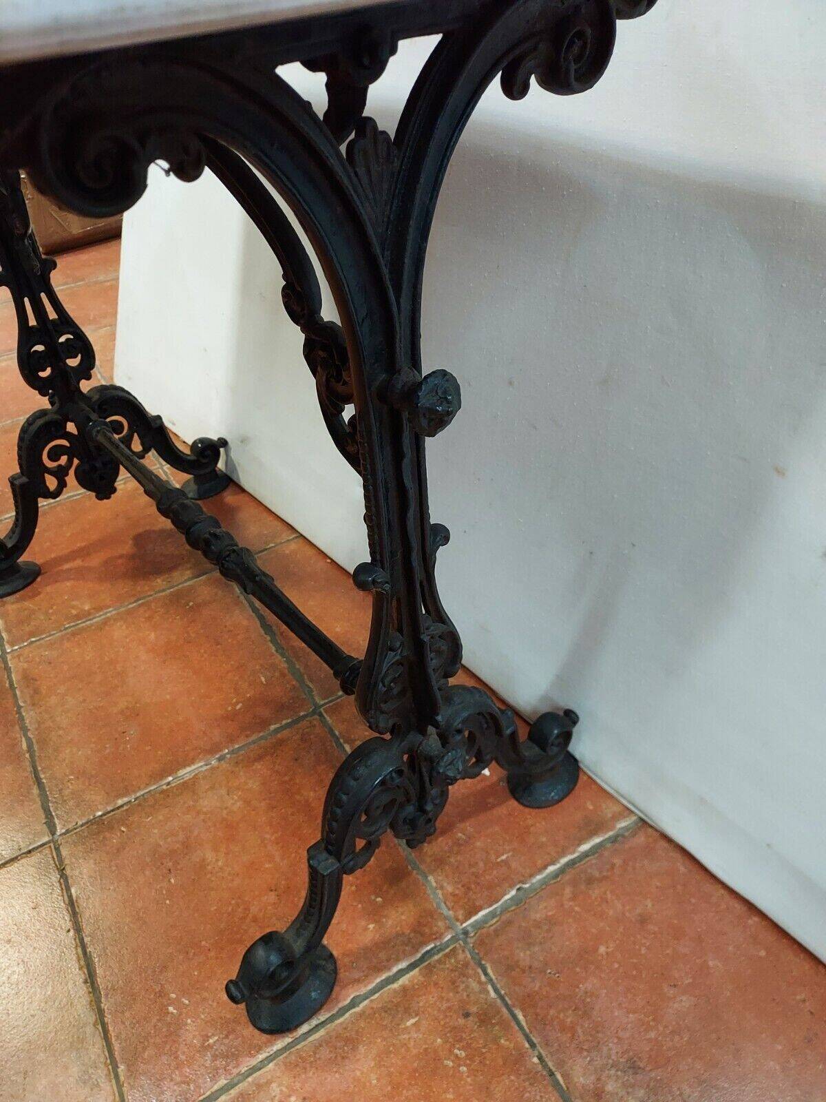 bistro table with cast iron base and marble top