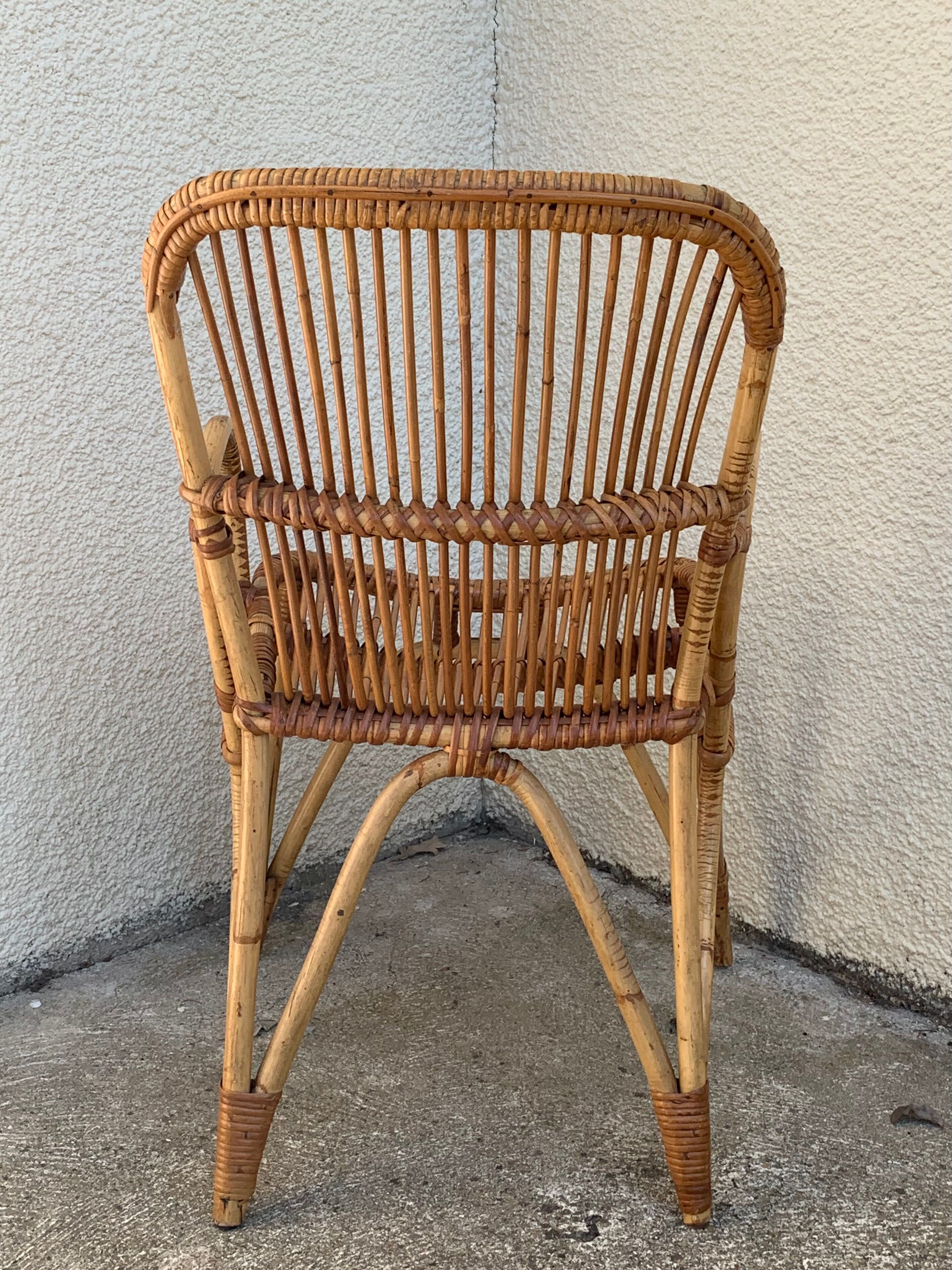 Chair and armchair in vintage rattan 1950