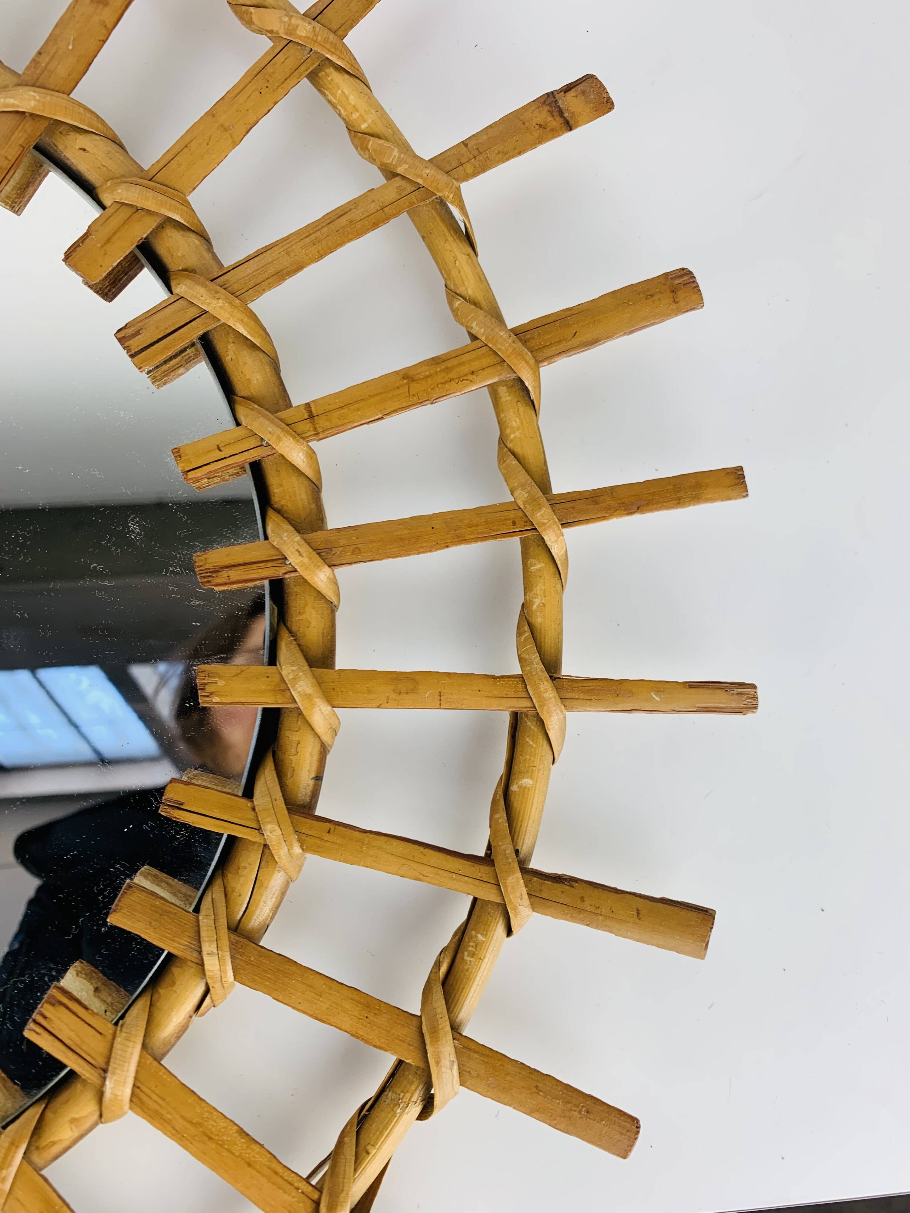 Vintage rattan sunburst mirror from the 1960s