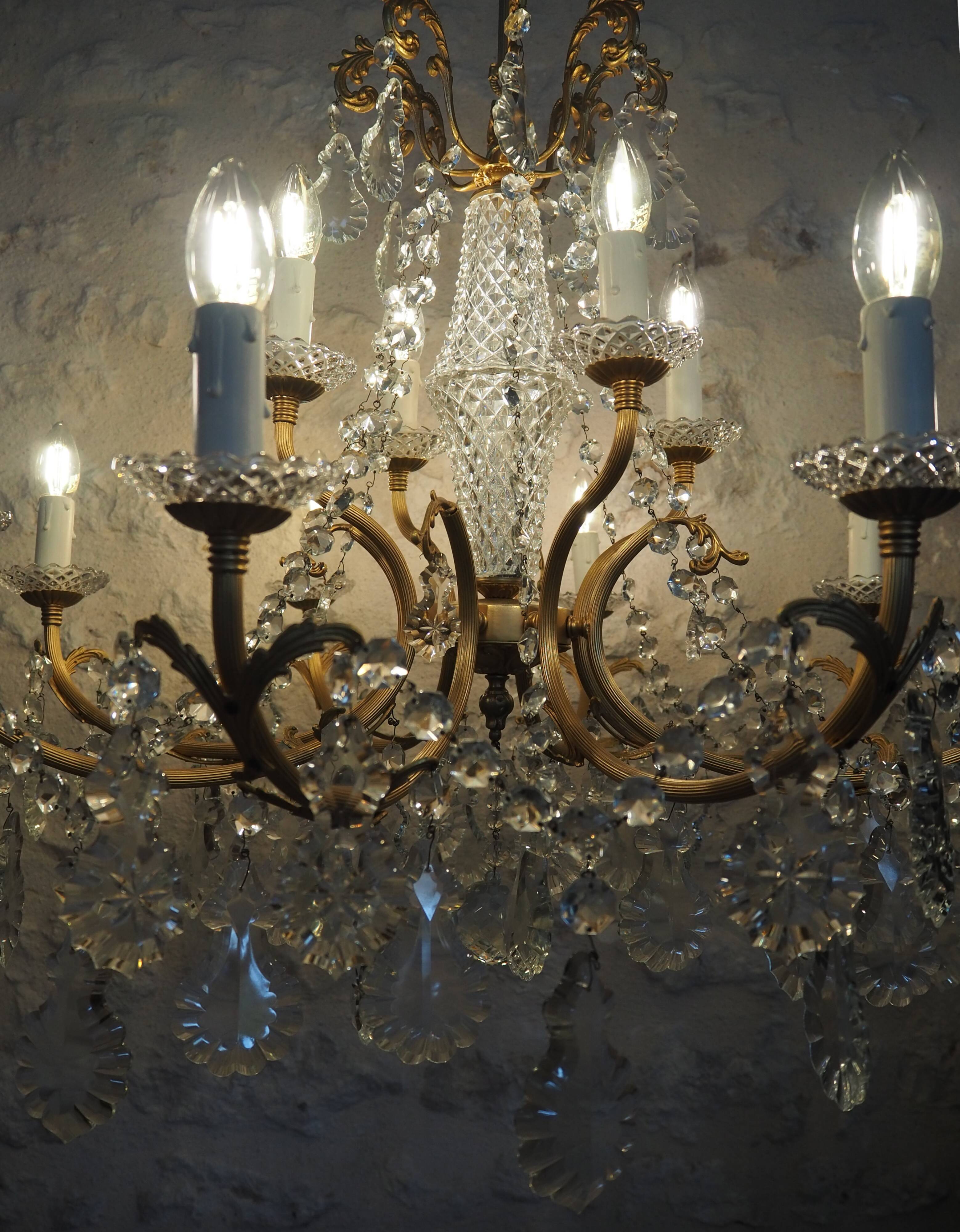 Chandelier 12 lamps with grapevines in crystal, bronze and regulated