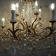 Chandelier 12 lamps with grapevines in crystal, bronze and regulated