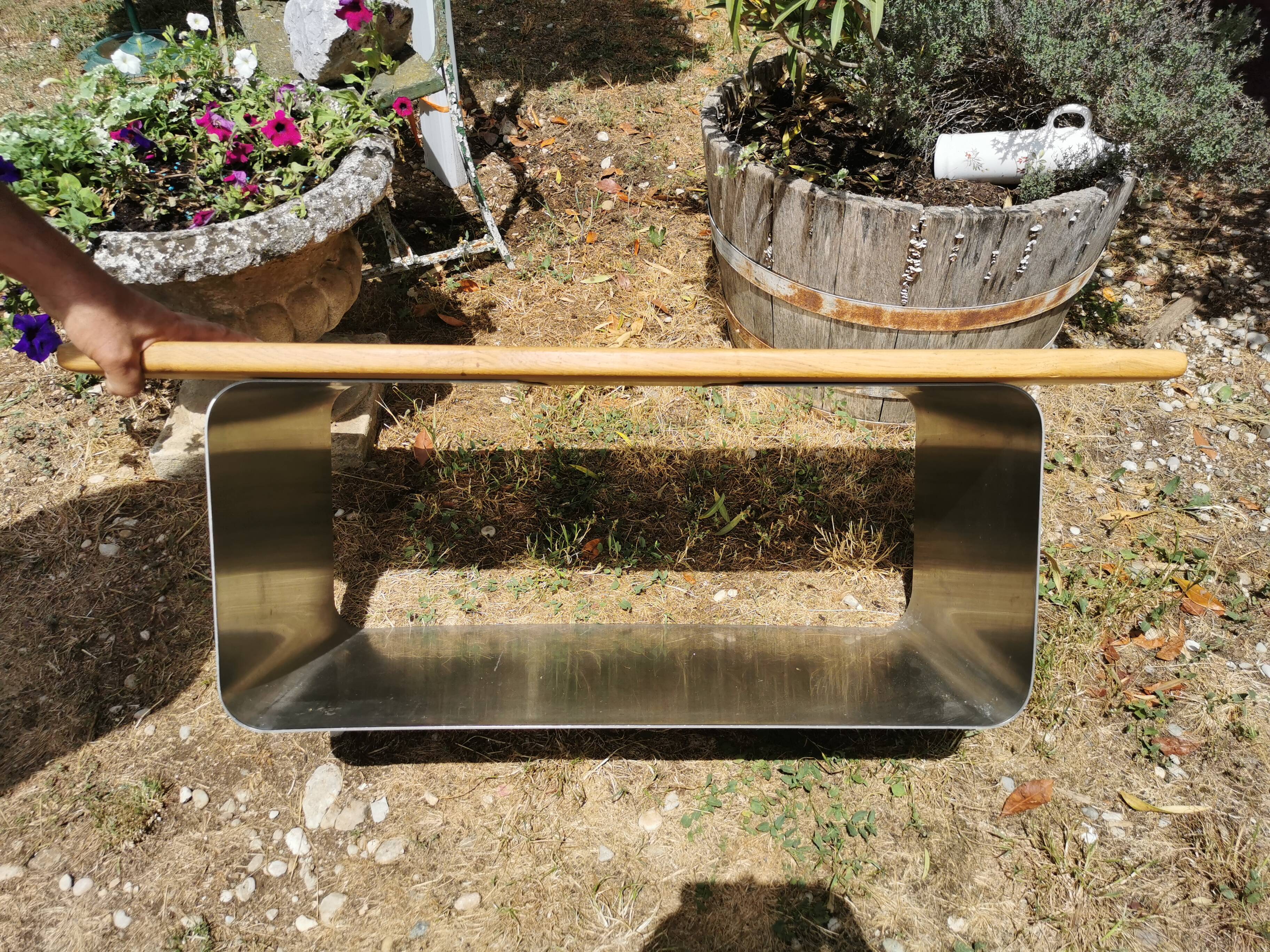 Designer coffee table in brushed stainless steel and light-tinted solid oak top